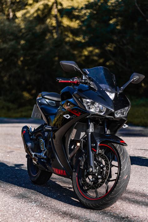 Supersport black and red YAMAHA R3 with Akrapovič exhaust system on ...