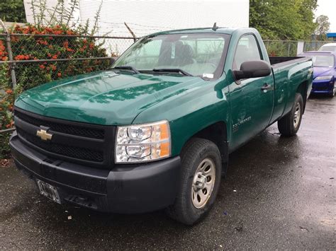 2007 CHEVROLET SILVERADO 4X4, 2 DOOR PU, GREEN, VIN # 1GCEK14X37Z592142