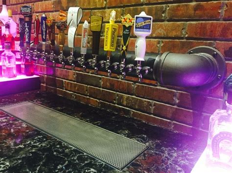 www.tappedbeer.com Custom draft beer towers Our black iron wall tap ...