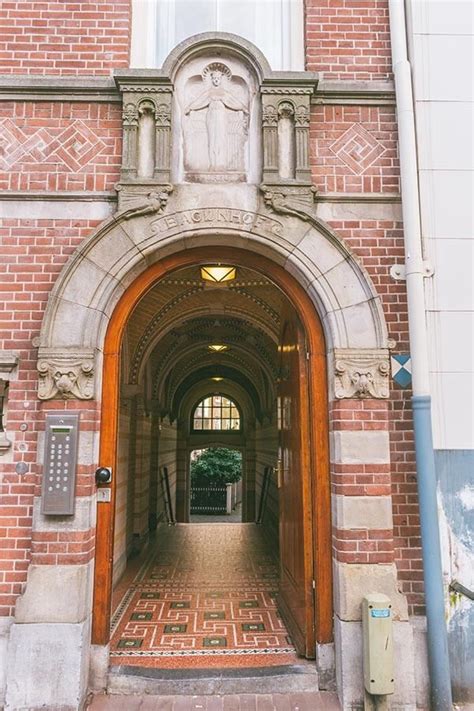 The entrance to the Begijnhof along Spui in Amsterdam. This is the ...