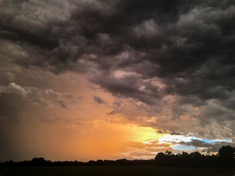 Rainbows and Storm Clouds at Sunset | All the Pages Are My Days