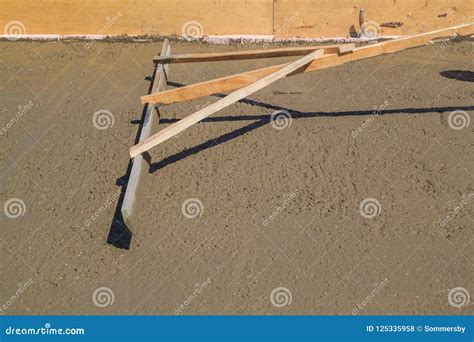 Leveling Concrete Slab with Special Working Tool Stock Photo - Image of ...