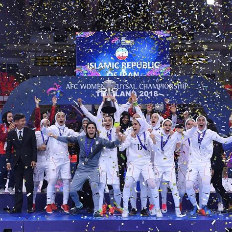 Iran celebrate with the 2018 AFC Women's Futsal Championship