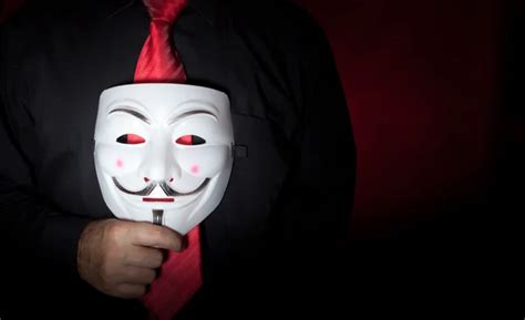 Anonymous mask man hacker – Stock Editorial Photo © namsilat #56476397