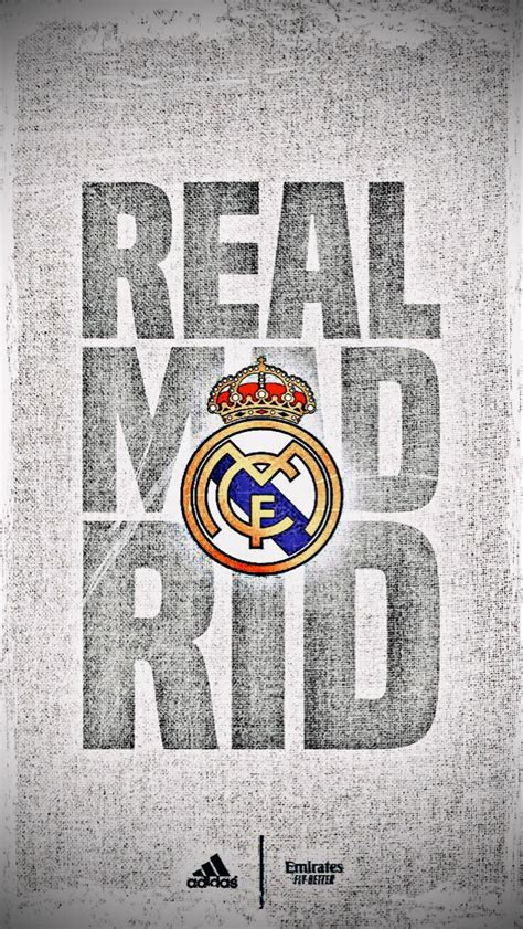 the real madrid logo is displayed on a wall