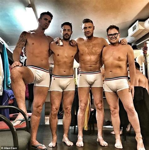 Alan Carr strips down to VERY tight boxers as he poses alongside Jamie ...