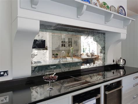 Antique mirrored splashback with bespoke centre piece canopy | Mirror ...