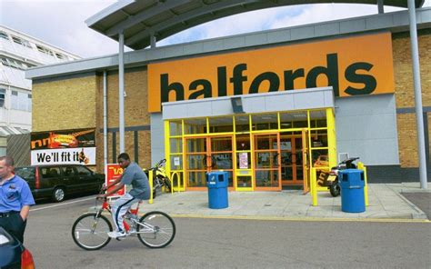 Halfords’ profits hit as sterling slump drives import costs