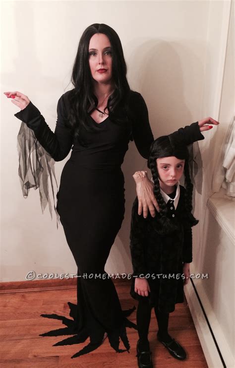 Cool Homemade Mom and Daughter Couple Costume: Morticia and Wednesday ...