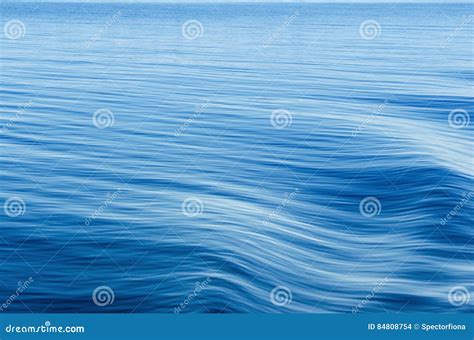 Waves on surface of water. stock photo. Image of flow - 84808754