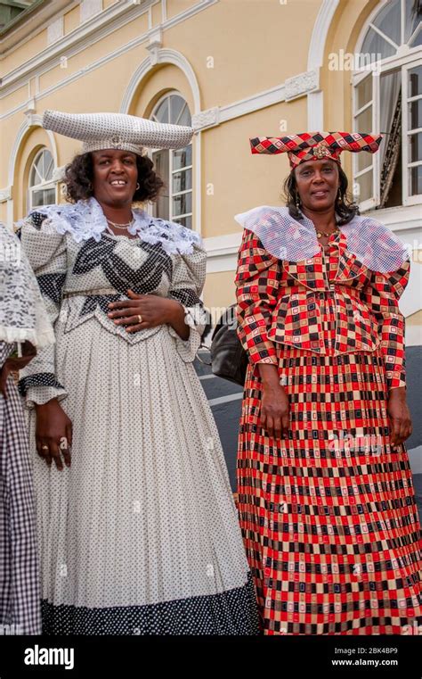 Two Herero women in their traditional dress in Swakomund, Namibia Stock ...