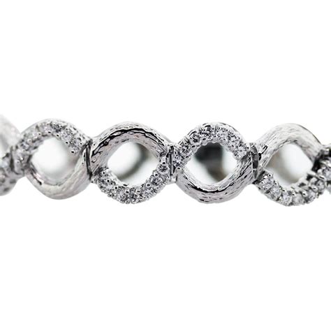 14K White Gold and Diamond Infinity Link Bracelet - Raymond Lee Jewelers