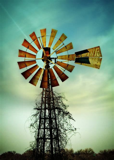 Old windmill w awesome colors all around. | Old windmills, Farm ...