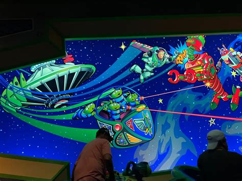 PHOTOS: Buzz Lightyear’s Space Ranger Spin Load Mural Updated, Now ...