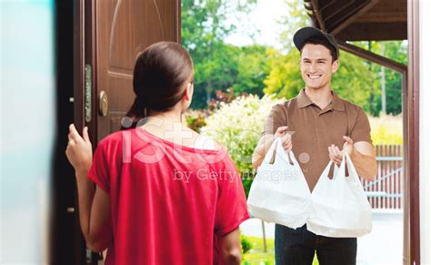 Delivery Man Delivering Chinese Take Away Food Stock Photo | Royalty ...