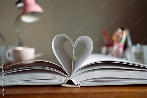 Heart symbol made from a book Stock Photo | Adobe Stock