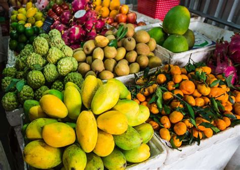 Exotic Fruits in the Asian Market Stock Photo - Image of mangos, food ...