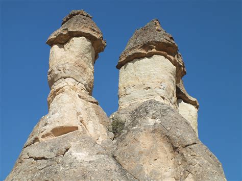 rock - object, no people, sky, sunlight, eroded, low angle view ...