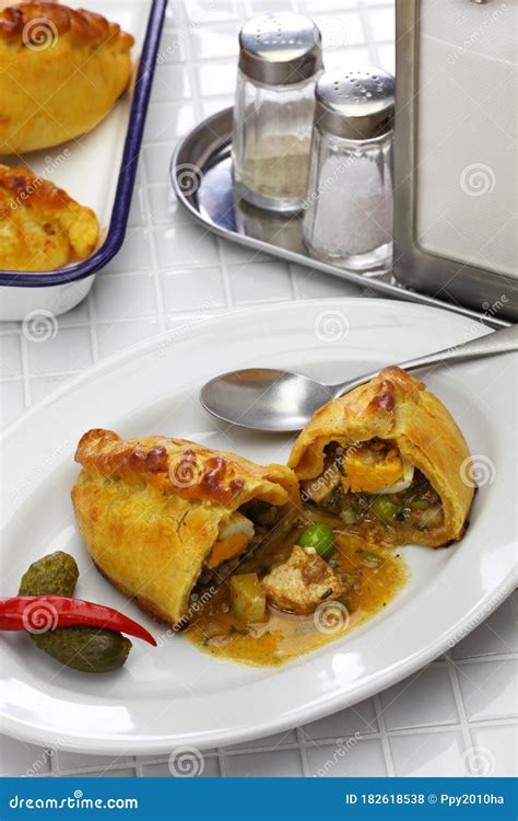 Saltena, Bolivian Juicy Filling Empanada Stock Photo - Image of mince ...