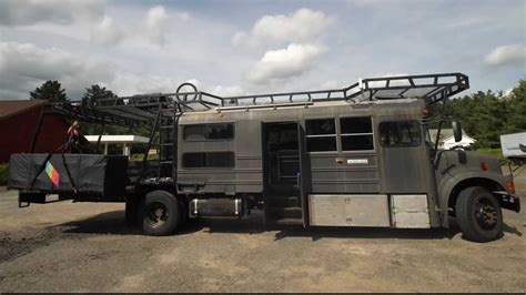 School bus motorhome is ready for anything with a crane and workshop on ...