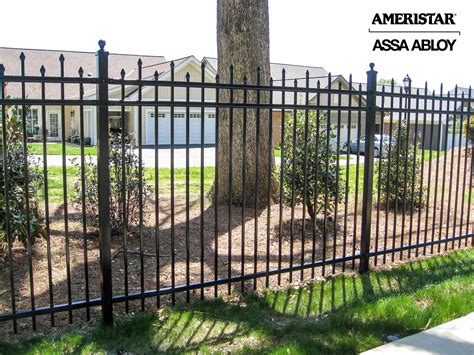 Black wrought iron fence in backyard and front yard Aluminum Fence ...