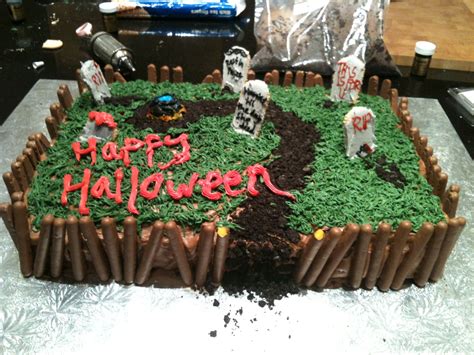 Halloween graveyard cake I made for a party. The dirt is oreos, with a ...