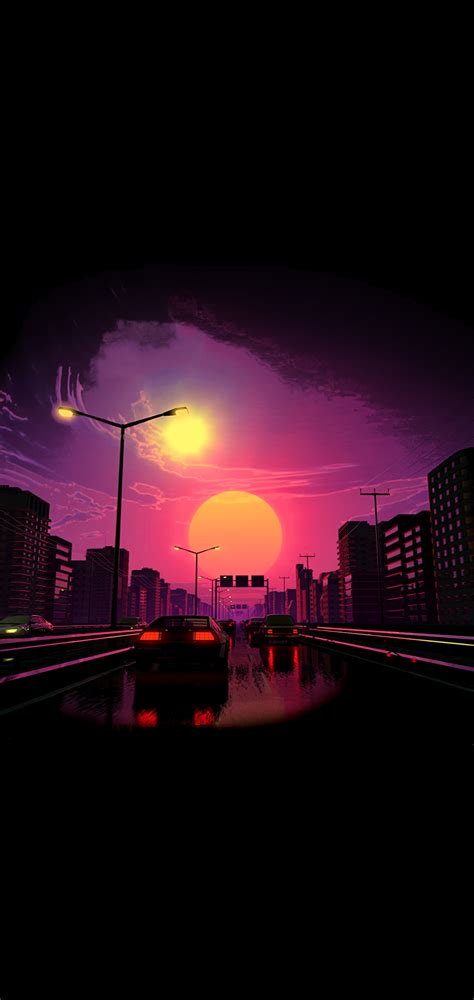 the sun is setting over a city with tall buildings and cars driving ...