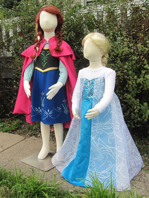 Anna and Elsa from Disney's Frozen movie. The Anna costume is a fully ...