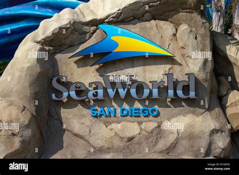 The SeaWorld logo at the entrance to SeaWorld San Diego, California ...