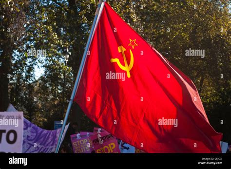 Red Communist flag with hammer and sickle and a star on a student ...