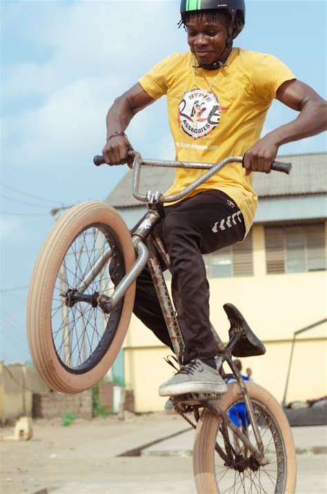 Young Boy Doing Tricks on a BMX Bike · Free Stock Photo