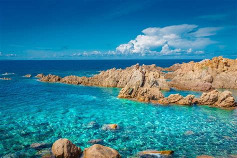 Crystal Clear Waters of Li Cossi Beach, Sardinia Stock Photo - Image of ...