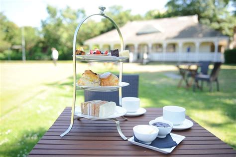 Afternoon tea on the lawn, The Kings Arms, Christchurch, Dorset, UK ...