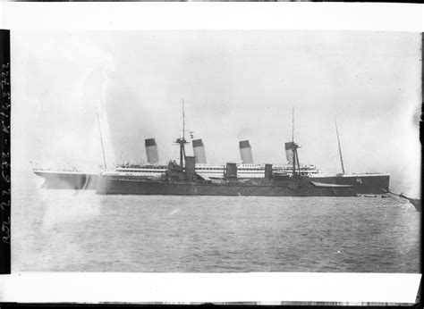 HMS Indefatigable at anchor. The battlecruiser was 590ft in length ...