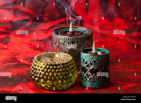 Burning aromatic incense cones Stock Photo - Alamy