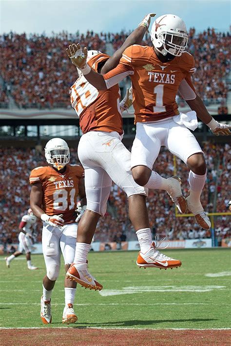 Greg Daniels (81), Malcolm Brown (28) and Mike Davis (1) University Of ...