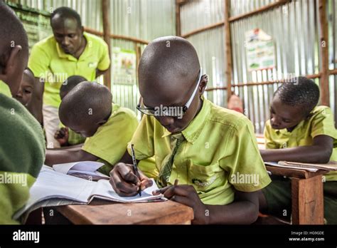 Bridge International Academies students in class at a school in Kampala ...