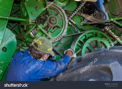 1,290 Farmer repairing tractor Images, Stock Photos & Vectors ...