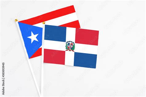 Dominican Republic and Puerto Rico stick flags on white background ...