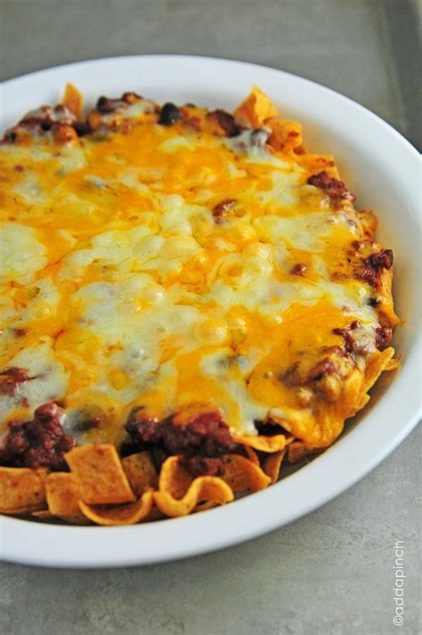 Frito Chili Pie - 2 cups Fritos corn chips, 3 cups chili, 8oz. cheddar ...