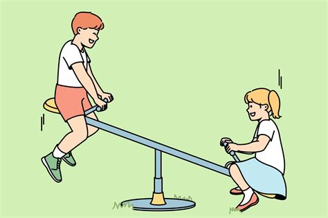 Children ride on teeter-totter at playground in summer. Boy, girl ...