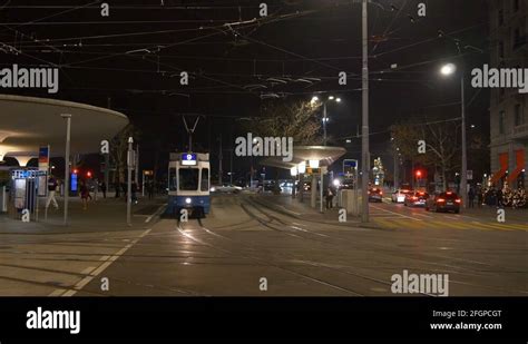 night zurich bellevue tram station traffic street panorama 4k ...