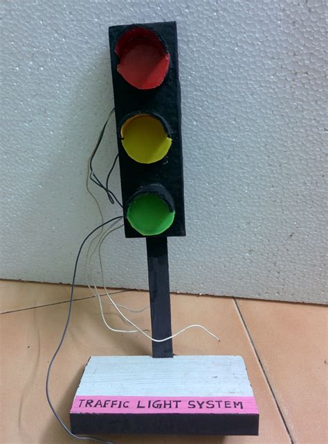 I made this traffic light project with cardboard, LED bulbs, and ...