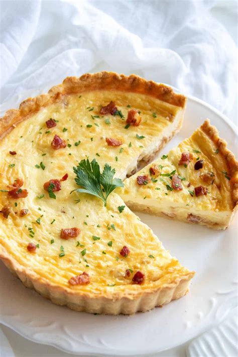 Classic Quiche Lorraine with a savory egg custard, bacon, and cheese ...