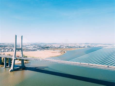 Aerial View of Vasco Da Gama Bridge and High Car Traffic in Lisbon City ...