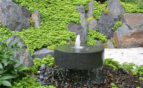 Black Polished Millstone Fountain | Niwa Design Studio, Ltd