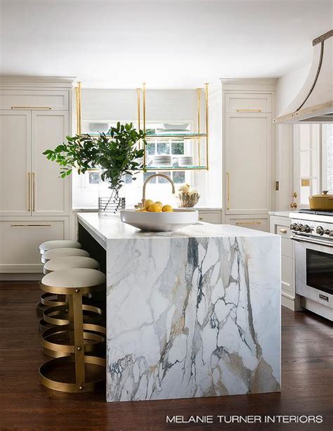 Marble Waterfall island with White and Gold Stools - Contemporary - Kitchen