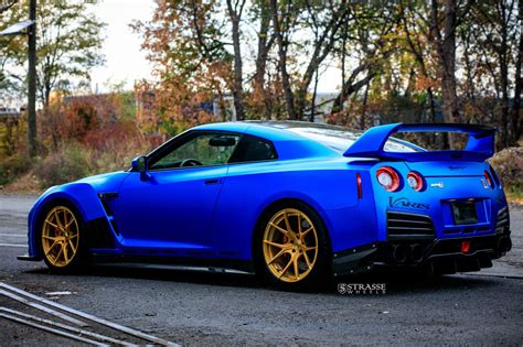 Outstanding Blue Nissan GT-R with Custom Vented Hood and Gold Rims ...