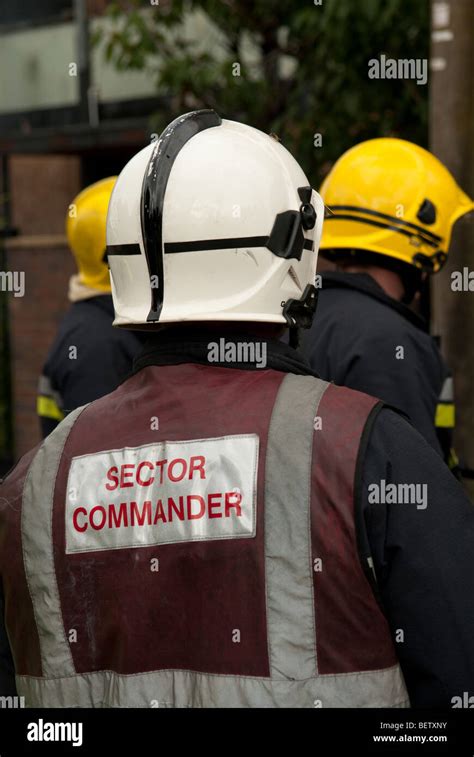 Fire Service Sector Commander with White Helmet Stock Photo - Alamy