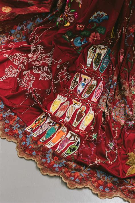 Intricate Red Dress Was Made by Artists from the Around the World